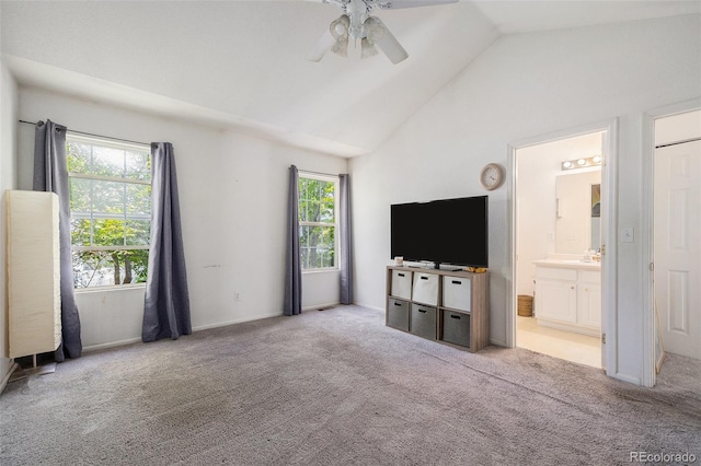 1655 S Buckley Cir, Aurora, CO 80017 - unfurnished bedroom with multiple windows, carpet flooring, connected bathroom, and high vaulted ceiling