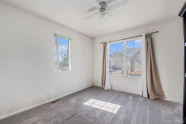 1655 S Buckley Cir, Aurora, CO 80017 - unfurnished room with carpet flooring, a ceiling fan, and baseboards