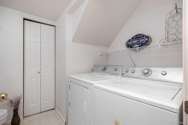 1655 S Buckley Cir, Aurora, CO 80017 - washroom featuring washer and dryer and light flooring