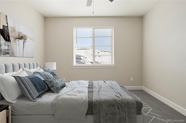 carpeted bedroom featuring ceiling fan