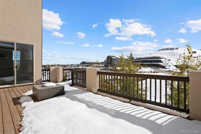 view of snow covered deck