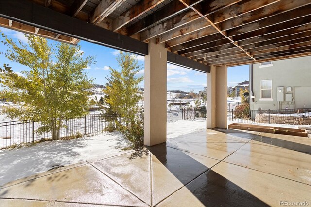 view of snow covered patio