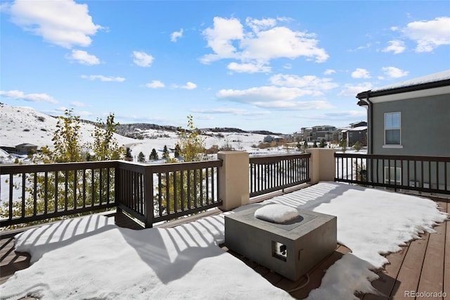 view of snow covered deck