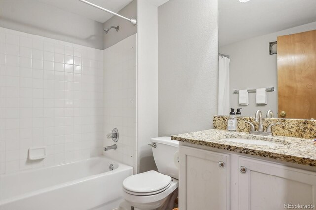 21961 E Crestline Pl, Aurora, CO 80015 - full bathroom featuring toilet, shower / bathing tub combination, and vanity