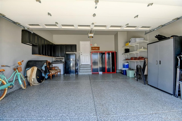 garage featuring freestanding refrigerator