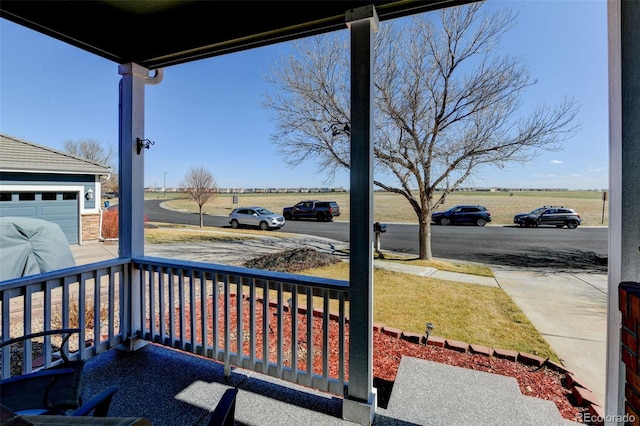 balcony featuring a porch