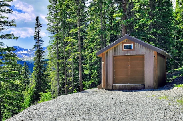 view of outdoor structure featuring a mountain view