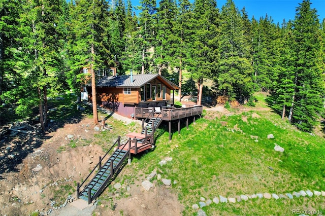 view of yard featuring a wooden deck