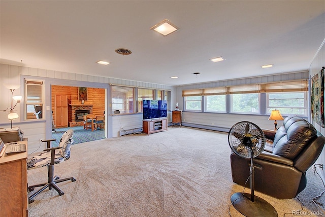 8300 W 67th Ave, Arvada, CO 80004 - carpeted living room with a brick fireplace and a baseboard radiator