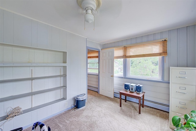 8300 W 67th Ave, Arvada, CO 80004 - carpeted bedroom with a baseboard heating unit, a ceiling fan, and crown molding