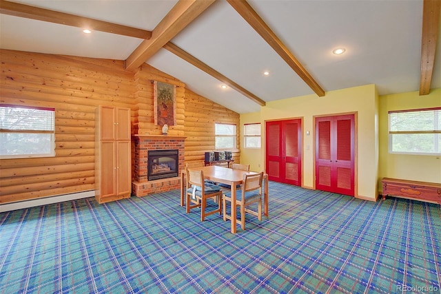 8300 W 67th Ave, Arvada, CO 80004 - dining room with dark colored carpet, log walls, a fireplace, and recessed lighting