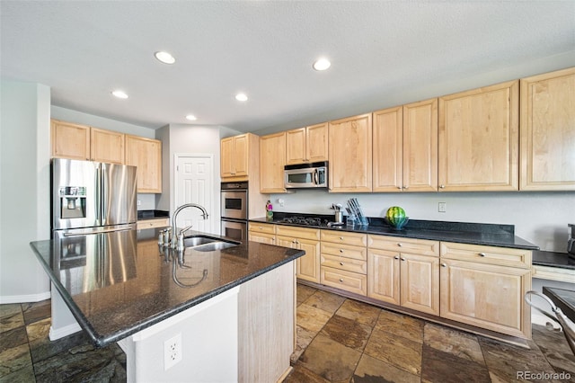 22227 E Hinsdale Ave, Aurora, CO 80016 - kitchen featuring light brown cabinetry, a sink, stainless steel appliances, stone tile flooring, and recessed lighting