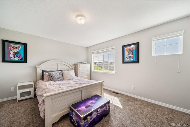 22227 E Hinsdale Ave, Aurora, CO 80016 - bedroom with carpet, multiple windows, and baseboards