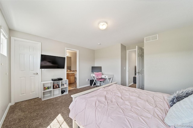 22227 E Hinsdale Ave, Aurora, CO 80016 - bedroom with carpet floors, baseboards, and ensuite bath