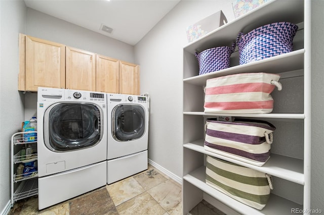 22227 E Hinsdale Ave, Aurora, CO 80016 - laundry room featuring cabinet space, washer and dryer, and baseboards