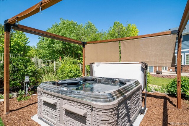 22227 E Hinsdale Ave, Aurora, CO 80016 - view of patio / terrace with a hot tub