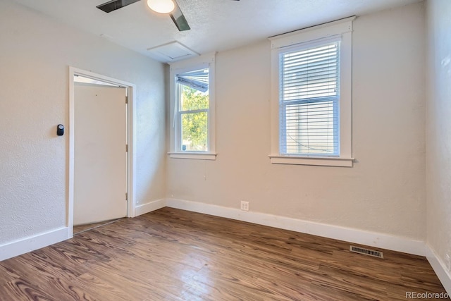 empty room featuring hardwood / wood-style flooring