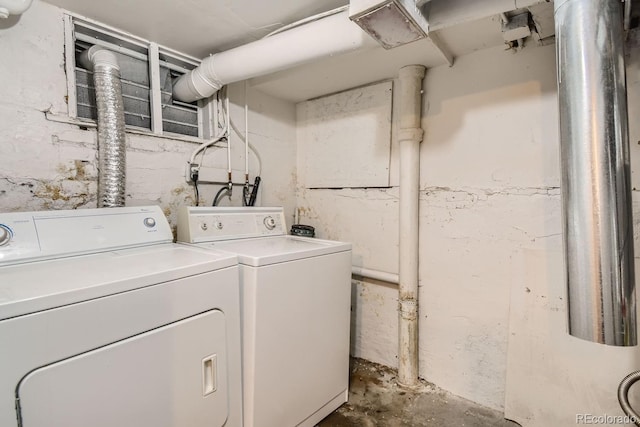 laundry room featuring washing machine and dryer