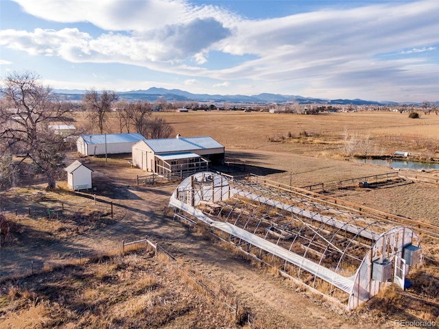 drone / aerial view with a rural view and a mountain view