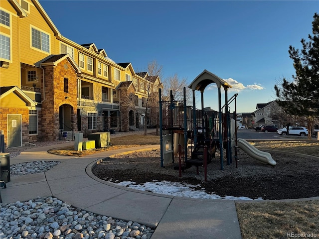 community playground featuring a residential view