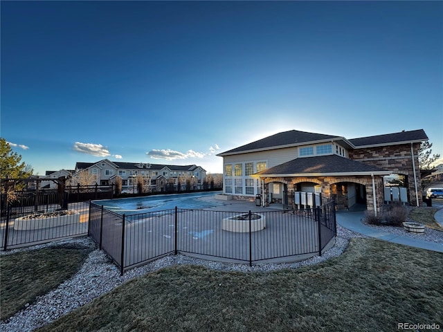 view of swimming pool with a yard and a patio area