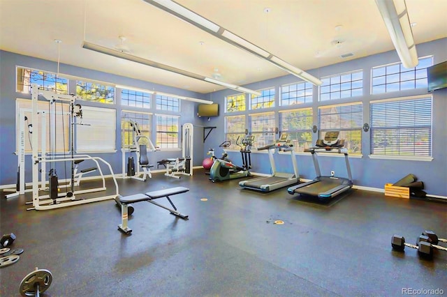 gym featuring visible vents and baseboards