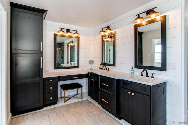 bathroom with double vanity and a sink