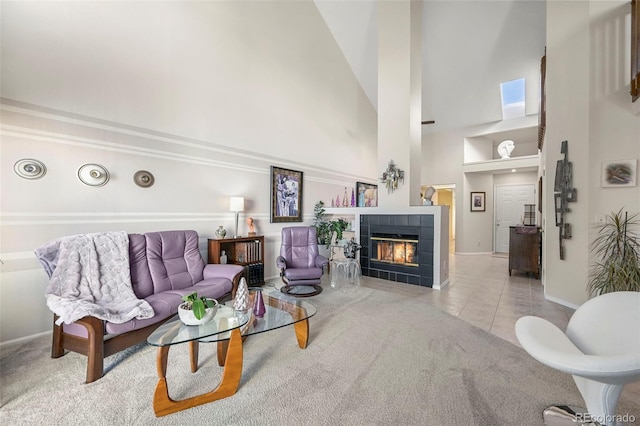 tiled living room with a fireplace and high vaulted ceiling