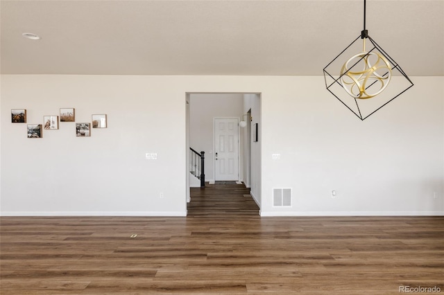 5840 Longs Peak St, Brighton, CO 80601 - spare room featuring wood finished floors and baseboards