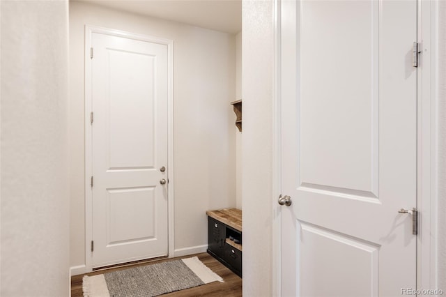 5840 Longs Peak St, Brighton, CO 80601 - mudroom featuring wood finished floors and baseboards