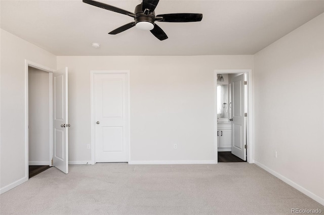 5840 Longs Peak St, Brighton, CO 80601 - unfurnished bedroom featuring carpet floors, ensuite bathroom, and ceiling fan