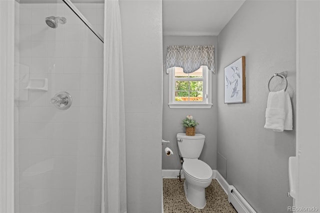 1033 Estes St, Lakewood, CO 80215 - full bath featuring a tile shower, a baseboard heating unit, and speckle patterned floor