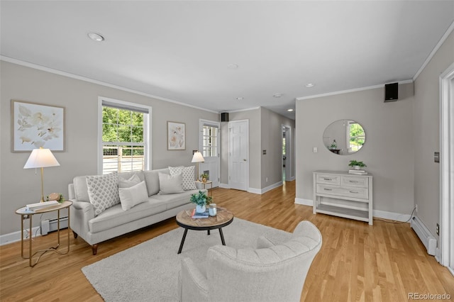 1033 Estes St, Lakewood, CO 80215 - living area with a baseboard radiator, crown molding, light wood finished floors, and recessed lighting
