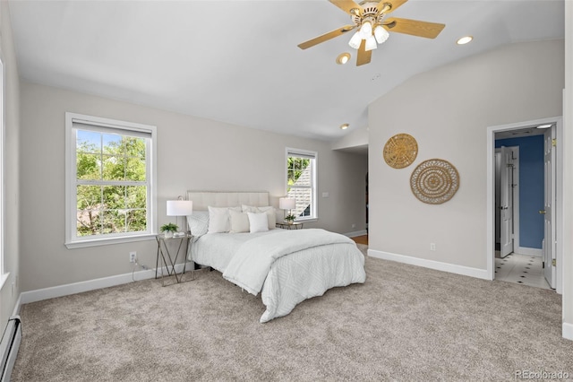 1033 Estes St, Lakewood, CO 80215 - carpeted bedroom featuring vaulted ceiling, a baseboard radiator, recessed lighting, and a ceiling fan