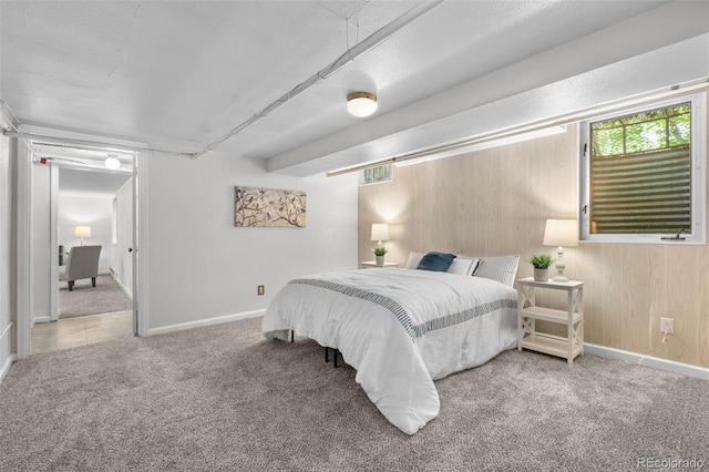 1033 Estes St, Lakewood, CO 80215 - carpeted bedroom with wood walls and baseboards