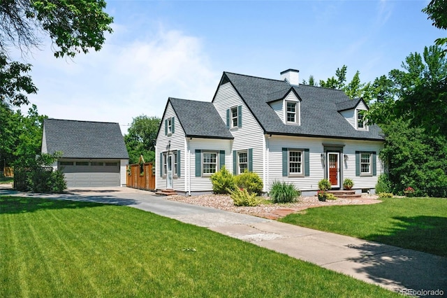1033 Estes St, Lakewood, CO 80215 - new england style home with a chimney, an outbuilding, and roof with shingles
