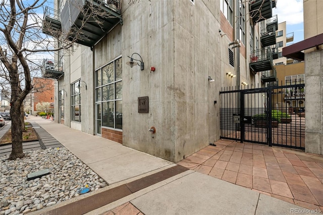 1050 Cherokee St Unit 403, Denver, CO 80204 - view of property exterior with a gate and fence