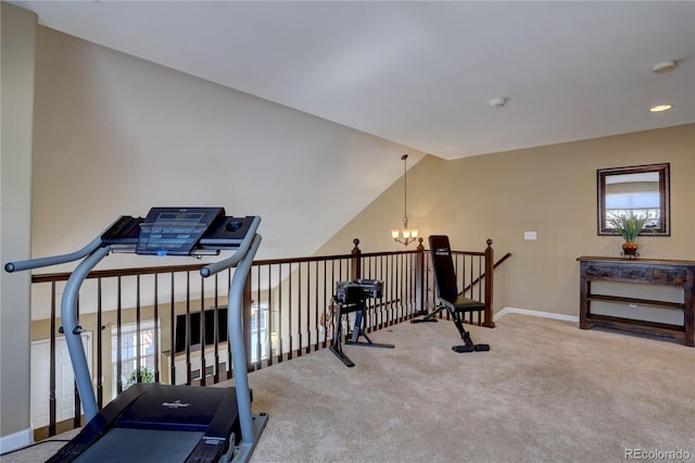 workout room with vaulted ceiling, baseboards, carpet floors, and a chandelier