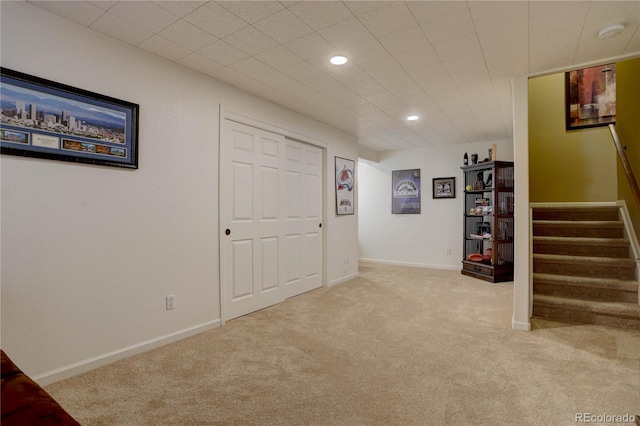 interior space with stairs, recessed lighting, baseboards, and carpet floors