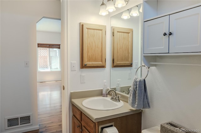 7978 S Johnson Ct, Littleton, CO 80128 - half bathroom with vanity and toilet