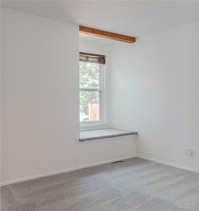 7978 S Johnson Ct, Littleton, CO 80128 - carpeted spare room with beamed ceiling and baseboards