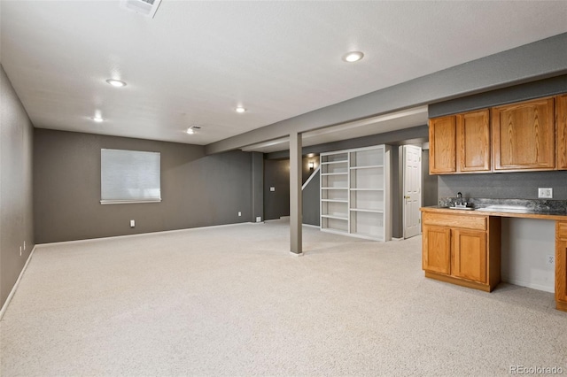 8829 S Dudley St, Littleton, CO 80128 - finished basement featuring light carpet and recessed lighting