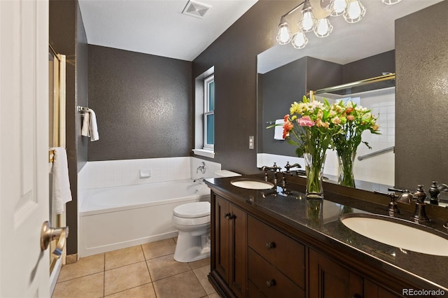 8829 S Dudley St, Littleton, CO 80128 - full bathroom featuring a textured wall, double vanity, tile patterned floors, a bath, and a shower