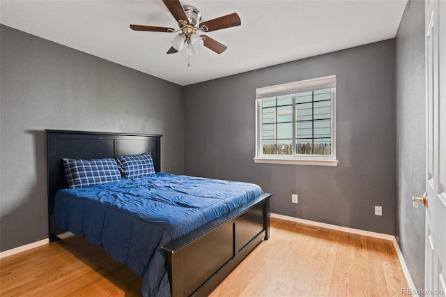 8829 S Dudley St, Littleton, CO 80128 - bedroom featuring wood finished floors and ceiling fan