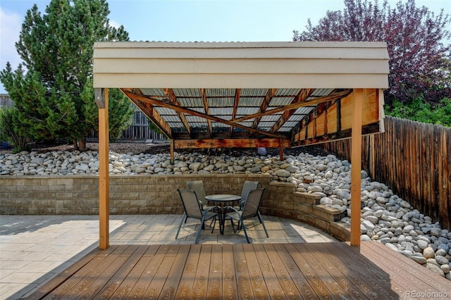 8829 S Dudley St, Littleton, CO 80128 - wooden deck with a patio area and outdoor dining area