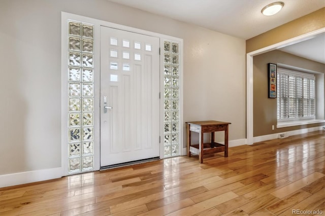 6062 S Emporia Cir, Englewood, CO 80111 - entrance foyer with baseboards and hardwood / wood-style floors