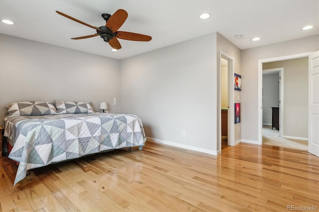 6062 S Emporia Cir, Englewood, CO 80111 - bedroom with recessed lighting, baseboards, and light wood-style flooring