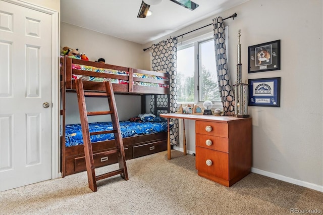 6062 S Emporia Cir, Englewood, CO 80111 - carpeted bedroom with baseboards and a ceiling fan