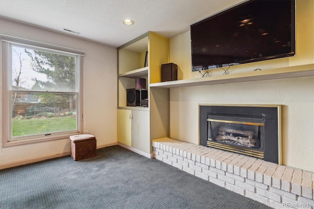 6062 S Emporia Cir, Englewood, CO 80111 - unfurnished living room with a fireplace, carpet, recessed lighting, baseboards, and visible vents