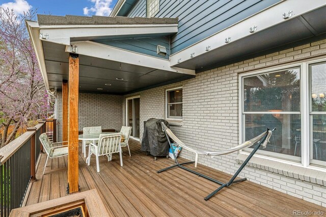 6062 S Emporia Cir, Englewood, CO 80111 - wooden deck with outdoor dining space